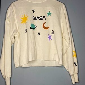 This is a Mighty Fine, medium, white, or sweatshirt/long sleeve.